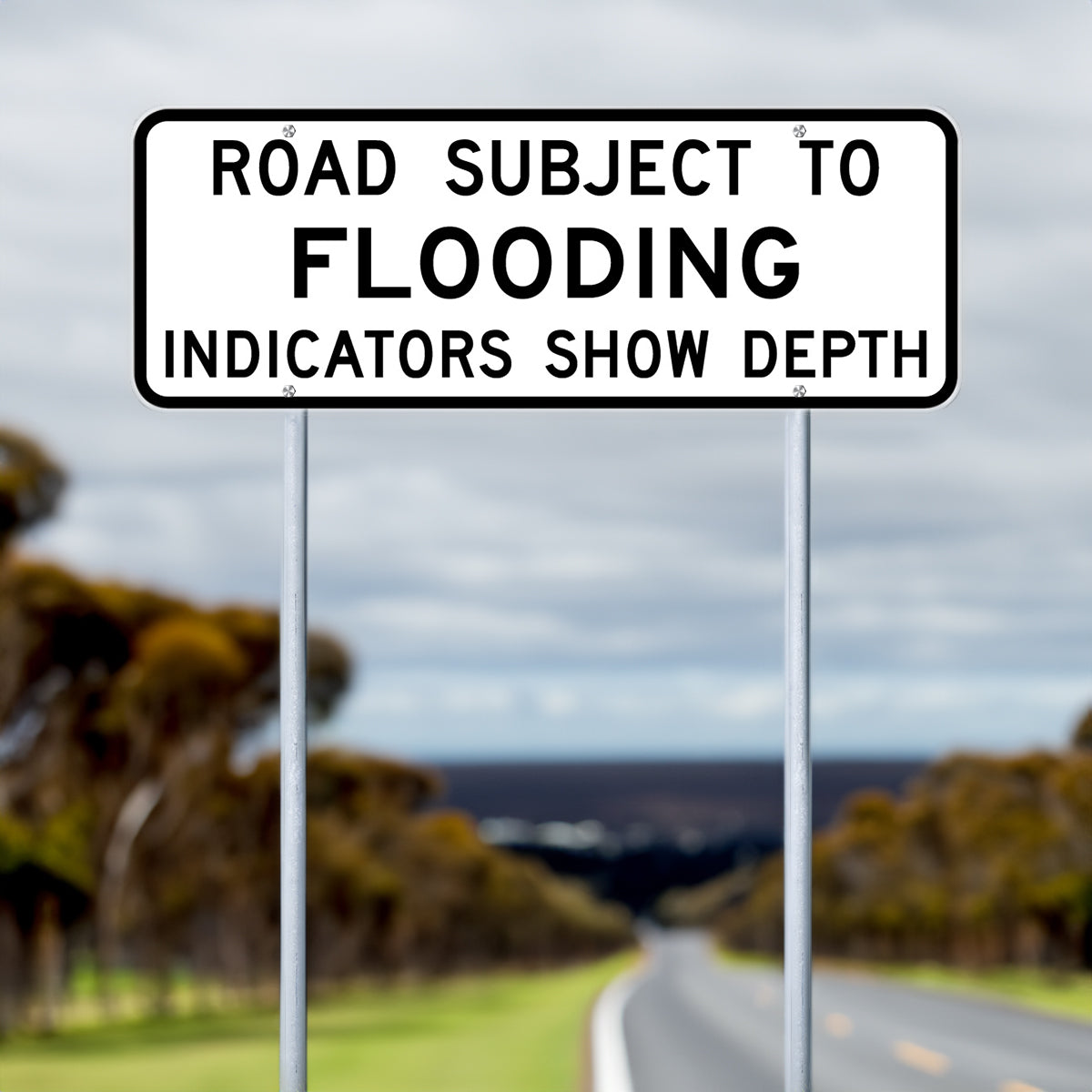 Road Subject To Flooding Sign