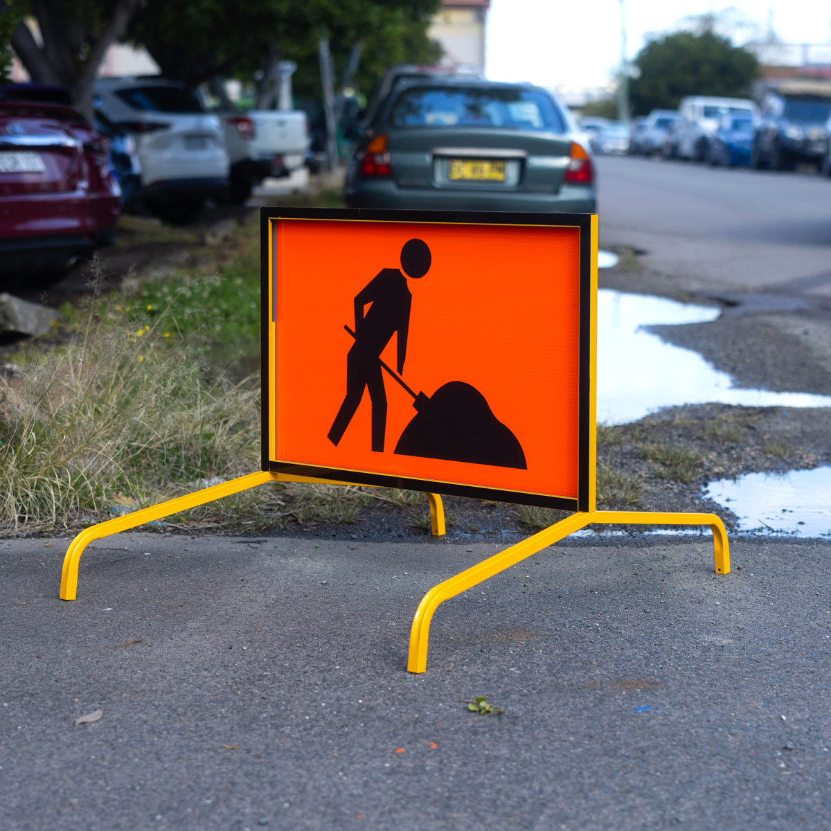 Warning: Workmen Ahead Sign