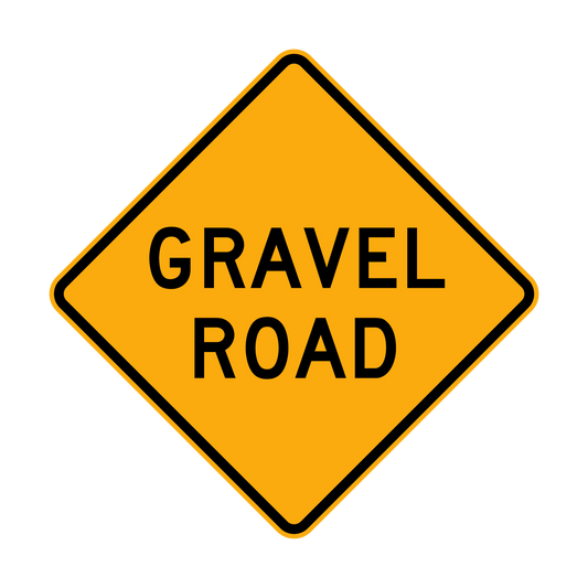 Warning: Gravel Road Sign