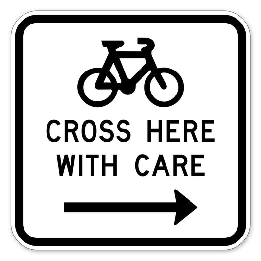 Bicycles Cross Here With Care Sign