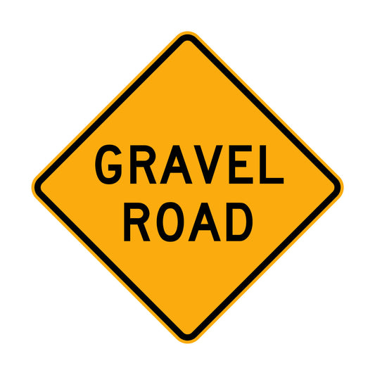 Warning: Gravel Road Sign